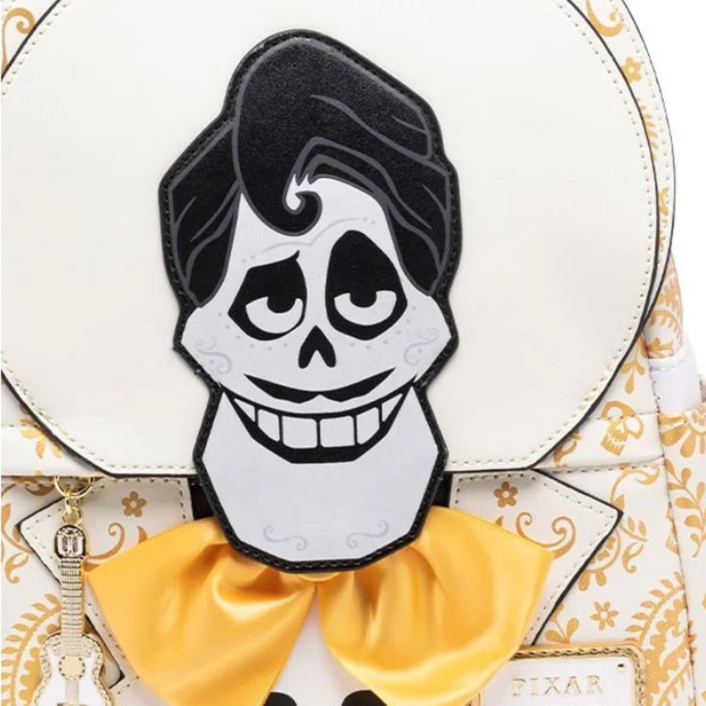 Disney Pixar Ernesto from coco Loungefly  Backpack with Yellow Bow